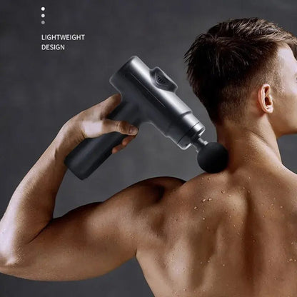 deep tissue massage gun in use